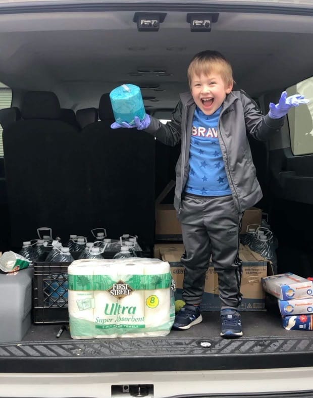 Kid in the truck delivering supplies