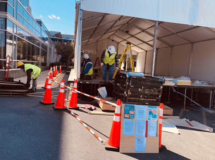 The team from Select Event Group building a temporary hospital structure