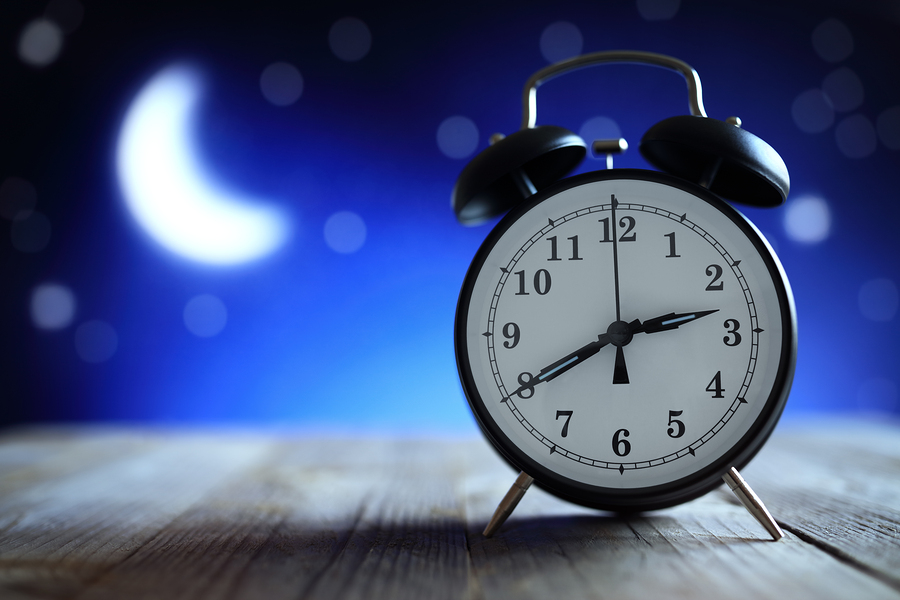 bigstock-alarm-clock-in-the-middle-of-t-169197263