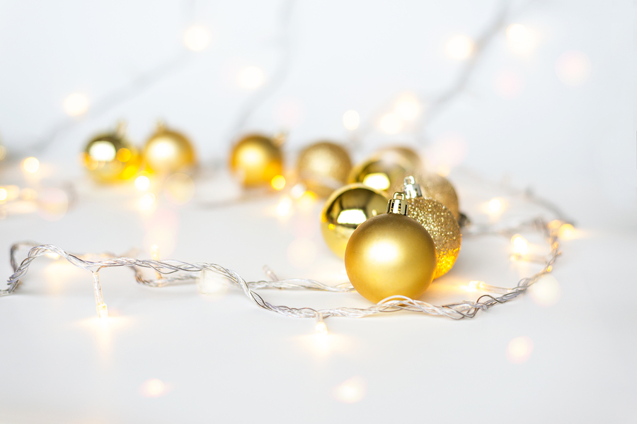christmas-lights-in-warm-yellow-white-on-string-and-gold-xmas-ba