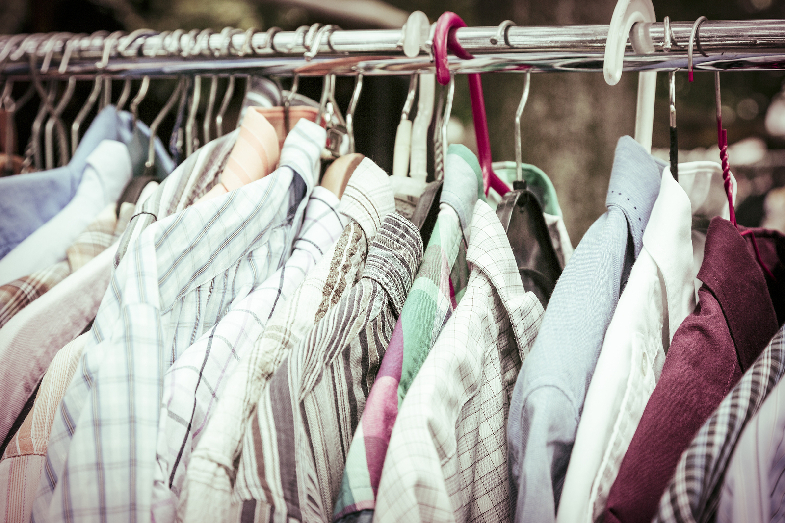 clothes-on-a-rack-on-a-flea-market