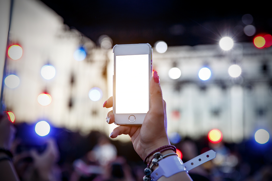 using-a-mobile-phone-on-a-summer-music-show-blank-screen