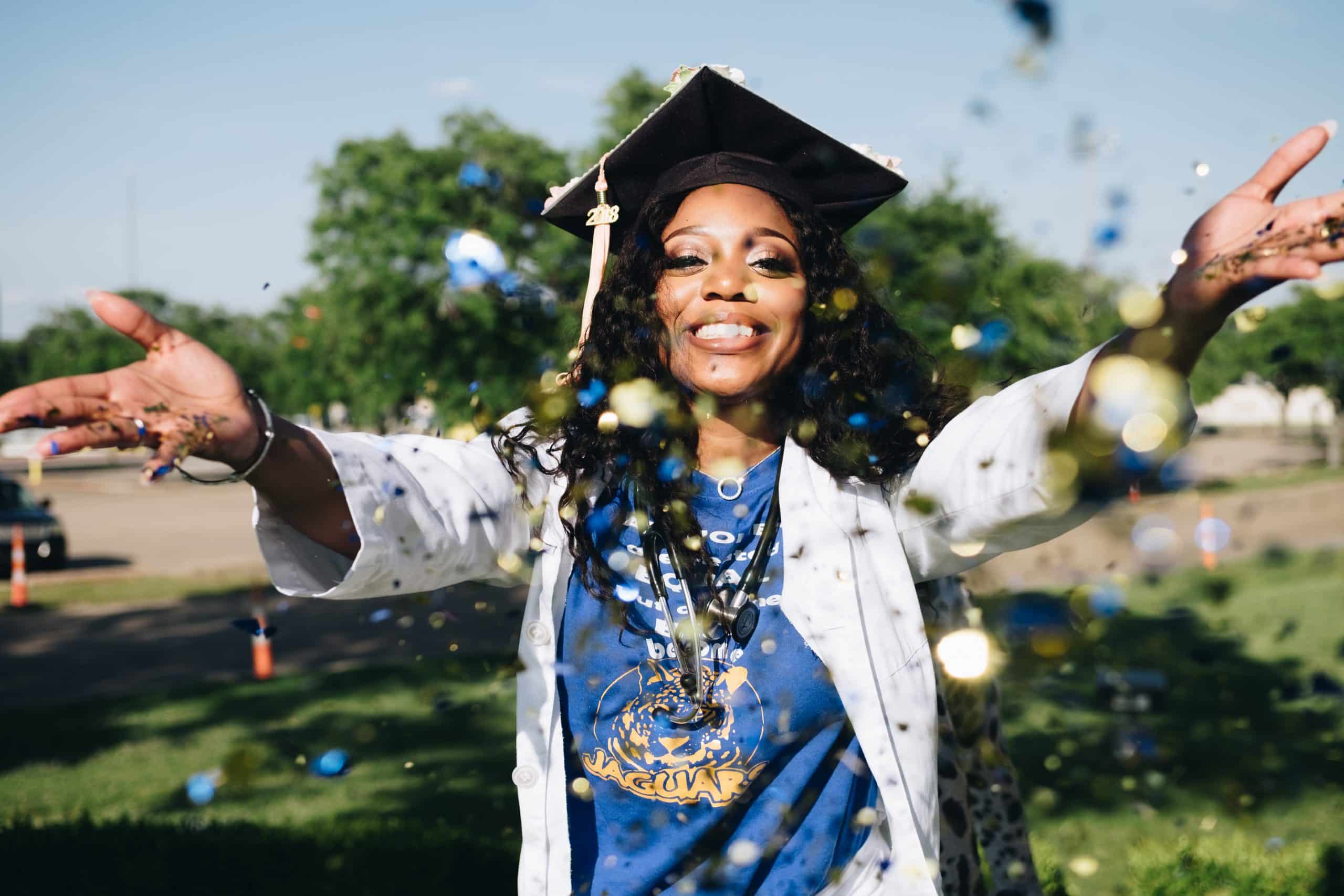woman-throwing-confetti-1139317-scaled-1