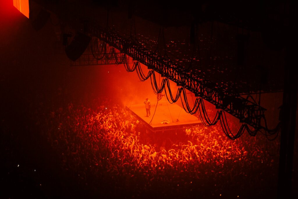 aerial view of live event concert with red lights